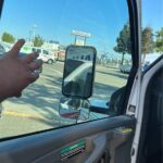 Mechanic driving to the location of a vehicle repair